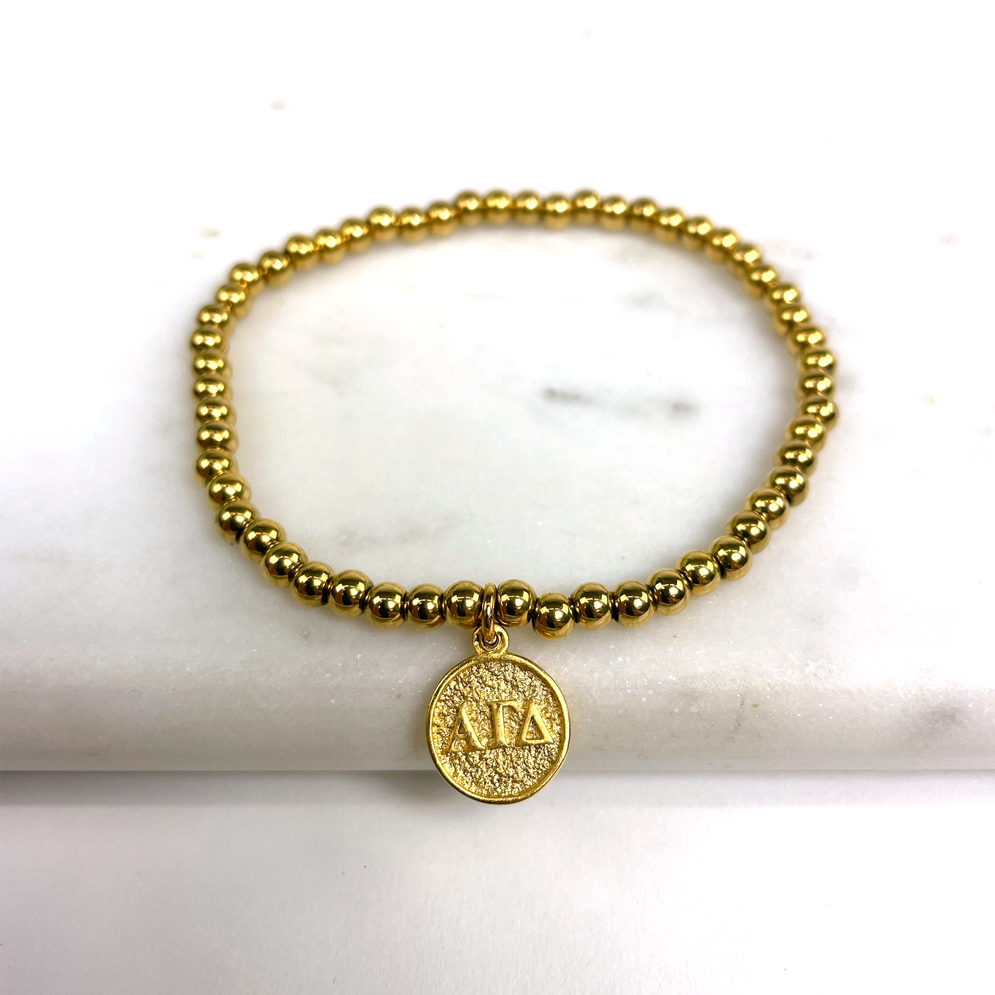 Alpha Gamma Delta Gold Beaded Stretch Bracelet