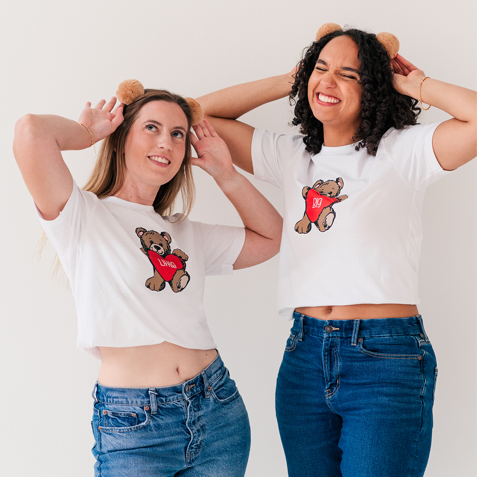 a couple of women standing next to each other